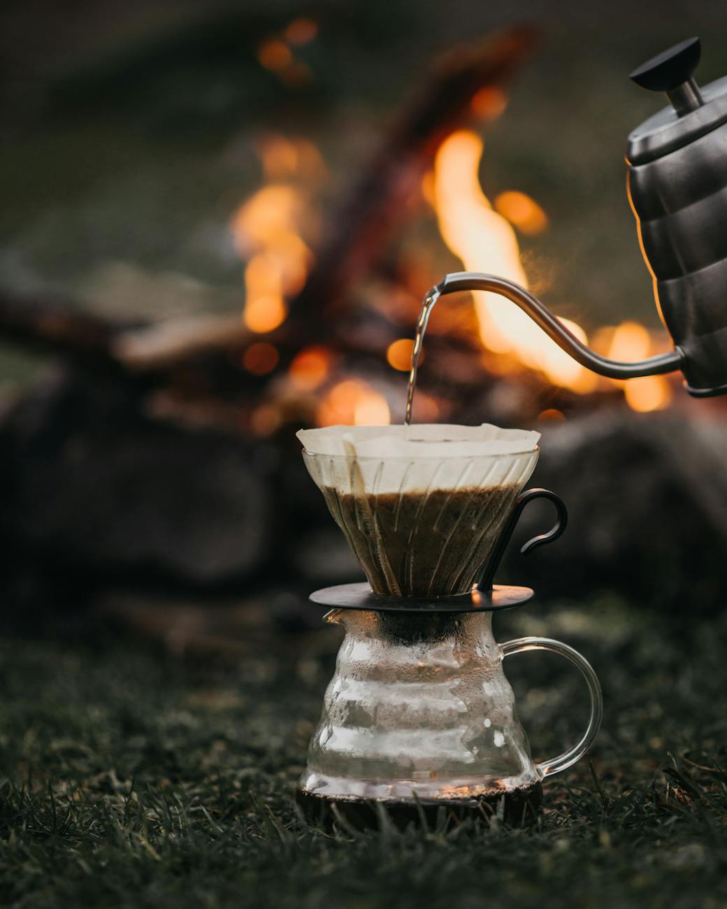 pour over coffee near burning bonfire